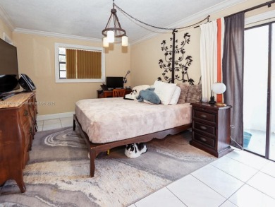 Spacious 2 bedroom, 2 bathroom home filled with natural sunlight on Normandy Shores Golf Course in Florida - for sale on GolfHomes.com, golf home, golf lot
