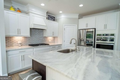This stunning, *practically new*, and move-in ready home, sits on Reunion Golf Club in Georgia - for sale on GolfHomes.com, golf home, golf lot