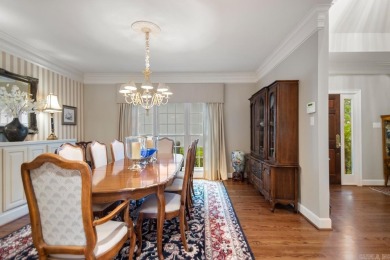 Welcome inside this light-filled home located on the 1st fairway on Chenal Country Club - Bear Den Mountain in Arkansas - for sale on GolfHomes.com, golf home, golf lot