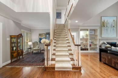 Welcome inside this light-filled home located on the 1st fairway on Chenal Country Club - Bear Den Mountain in Arkansas - for sale on GolfHomes.com, golf home, golf lot