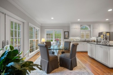 Welcome inside this light-filled home located on the 1st fairway on Chenal Country Club - Bear Den Mountain in Arkansas - for sale on GolfHomes.com, golf home, golf lot