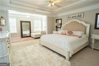 This stunning, *practically new*, and move-in ready home, sits on Reunion Golf Club in Georgia - for sale on GolfHomes.com, golf home, golf lot