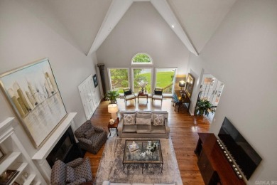 Welcome inside this light-filled home located on the 1st fairway on Chenal Country Club - Bear Den Mountain in Arkansas - for sale on GolfHomes.com, golf home, golf lot