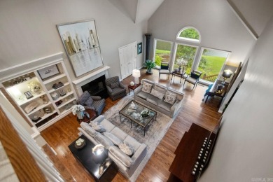 Welcome inside this light-filled home located on the 1st fairway on Chenal Country Club - Bear Den Mountain in Arkansas - for sale on GolfHomes.com, golf home, golf lot