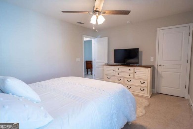 This stunning, *practically new*, and move-in ready home, sits on Reunion Golf Club in Georgia - for sale on GolfHomes.com, golf home, golf lot