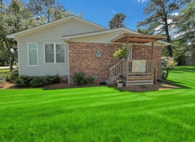 The Cottage At Lake Marion! Charming 3 bedroom, 2 bath second on Players Course At Wyboo Plantation in South Carolina - for sale on GolfHomes.com, golf home, golf lot