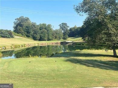 This stunning, *practically new*, and move-in ready home, sits on Reunion Golf Club in Georgia - for sale on GolfHomes.com, golf home, golf lot