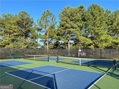 This stunning, *practically new*, and move-in ready home, sits on Reunion Golf Club in Georgia - for sale on GolfHomes.com, golf home, golf lot