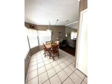 Welcome to this charming and meticulously maintained 2-bedroom on Schalamar Creek Golf and Country Club in Florida - for sale on GolfHomes.com, golf home, golf lot