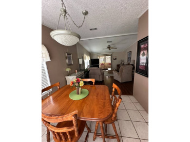 Welcome to this charming and meticulously maintained 2-bedroom on Schalamar Creek Golf and Country Club in Florida - for sale on GolfHomes.com, golf home, golf lot