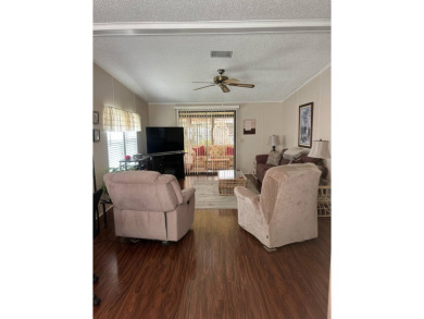 Welcome to this charming and meticulously maintained 2-bedroom on Schalamar Creek Golf and Country Club in Florida - for sale on GolfHomes.com, golf home, golf lot