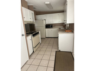 Welcome to this charming and meticulously maintained 2-bedroom on Schalamar Creek Golf and Country Club in Florida - for sale on GolfHomes.com, golf home, golf lot