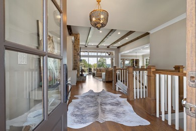 Luxury Lakefront Living. Welcome to 131 Cape View Lane, located on The Golf Club at Cuscowilla in Georgia - for sale on GolfHomes.com, golf home, golf lot