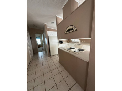 Welcome to this charming and meticulously maintained 2-bedroom on Schalamar Creek Golf and Country Club in Florida - for sale on GolfHomes.com, golf home, golf lot
