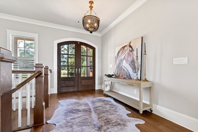 Luxury Lakefront Living. Welcome to 131 Cape View Lane, located on The Golf Club at Cuscowilla in Georgia - for sale on GolfHomes.com, golf home, golf lot