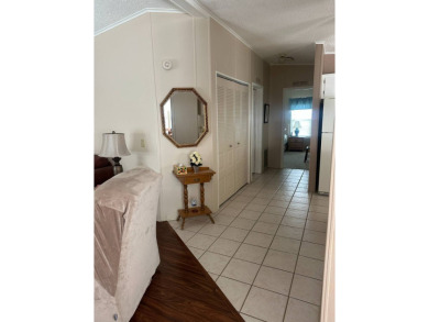 Welcome to this charming and meticulously maintained 2-bedroom on Schalamar Creek Golf and Country Club in Florida - for sale on GolfHomes.com, golf home, golf lot