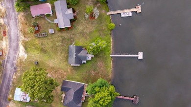 Enjoy boating, fishing & swimming from this recently renovated on Players Course At Wyboo Plantation in South Carolina - for sale on GolfHomes.com, golf home, golf lot