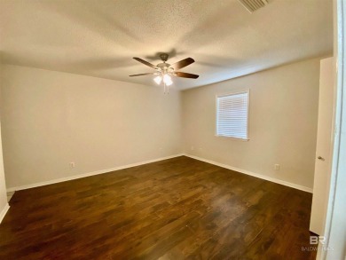 Welcome to this charming ranch-style home situated on a spacious on Vanity Fair Golf and Tennis Club in Alabama - for sale on GolfHomes.com, golf home, golf lot
