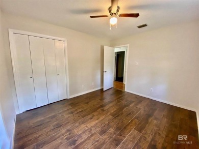 Welcome to this charming ranch-style home situated on a spacious on Vanity Fair Golf and Tennis Club in Alabama - for sale on GolfHomes.com, golf home, golf lot