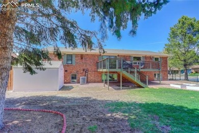 Tucked away with no rear neighbors, this home sits in the serene on Colorado Springs Country Club in Colorado - for sale on GolfHomes.com, golf home, golf lot