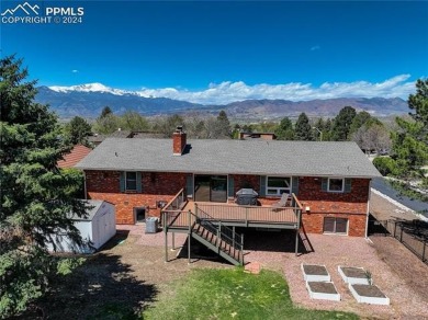 Tucked away with no rear neighbors, this home sits in the serene on Colorado Springs Country Club in Colorado - for sale on GolfHomes.com, golf home, golf lot