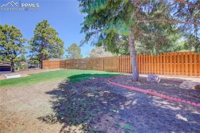 Tucked away with no rear neighbors, this home sits in the serene on Colorado Springs Country Club in Colorado - for sale on GolfHomes.com, golf home, golf lot