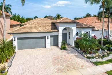 This 4 bedroom 3.1 bath courtyard home on the golf course in on Mizner Country Club in Florida - for sale on GolfHomes.com, golf home, golf lot