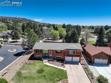 Tucked away with no rear neighbors, this home sits in the serene on Colorado Springs Country Club in Colorado - for sale on GolfHomes.com, golf home, golf lot