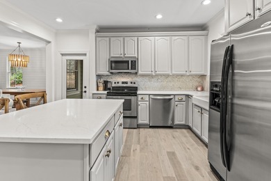 BEAUTIFULLY REFRESHED AND IDEALLY LOCATED IN THE SOUGHT AFTER on Reynolds Lake Oconee - The Landing in Georgia - for sale on GolfHomes.com, golf home, golf lot