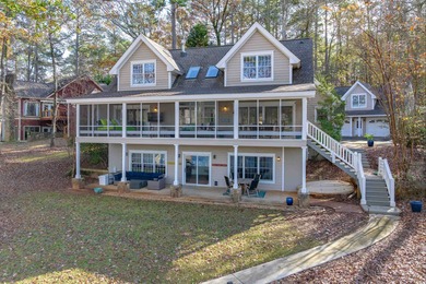 LAKEFRONT LIVING AND STUNNING VIEWS! Discover refined on Reynolds Lake Oconee - The Landing in Georgia - for sale on GolfHomes.com, golf home, golf lot