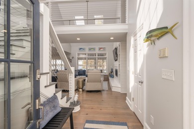 LAKEFRONT LIVING AND STUNNING VIEWS! Discover refined on Reynolds Lake Oconee - The Landing in Georgia - for sale on GolfHomes.com, golf home, golf lot