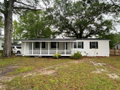 Come and see what Lake Marion living has to offer. This home at on Players Course At Wyboo Plantation in South Carolina - for sale on GolfHomes.com, golf home, golf lot