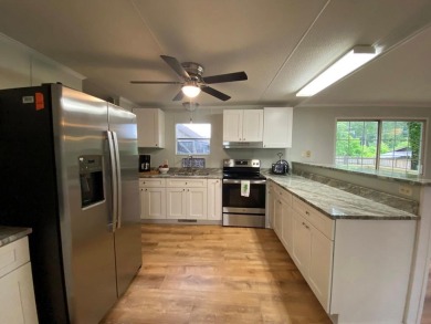 Come and see what Lake Marion living has to offer. This home at on Players Course At Wyboo Plantation in South Carolina - for sale on GolfHomes.com, golf home, golf lot