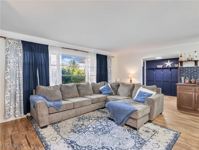 Beautiful 4-bedroom, 2-bath pool home in the highly desirable on Cypress Lake Country Club in Florida - for sale on GolfHomes.com, golf home, golf lot