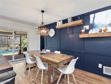 Beautiful 4-bedroom, 2-bath pool home in the highly desirable on Cypress Lake Country Club in Florida - for sale on GolfHomes.com, golf home, golf lot