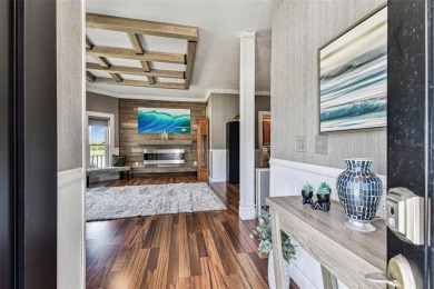 Nestled on a beautifully positioned corner lot directly across on Clearwater Country Club in Florida - for sale on GolfHomes.com, golf home, golf lot