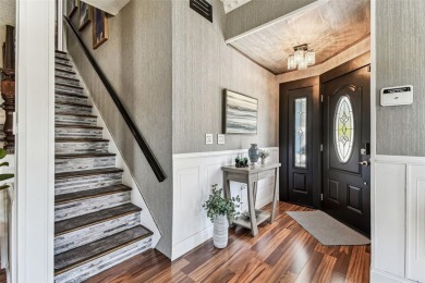 Nestled on a beautifully positioned corner lot directly across on Clearwater Country Club in Florida - for sale on GolfHomes.com, golf home, golf lot