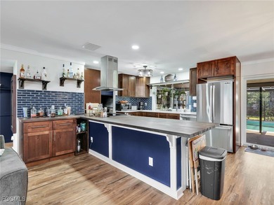 Beautiful 4-bedroom, 2-bath pool home in the highly desirable on Cypress Lake Country Club in Florida - for sale on GolfHomes.com, golf home, golf lot