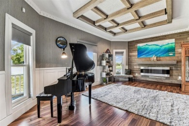 Nestled on a beautifully positioned corner lot directly across on Clearwater Country Club in Florida - for sale on GolfHomes.com, golf home, golf lot