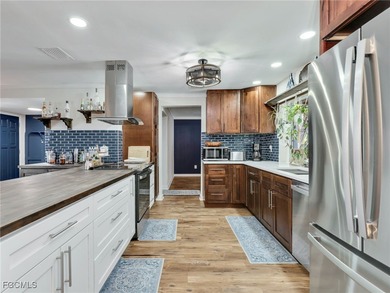 Beautiful 4-bedroom, 2-bath pool home in the highly desirable on Cypress Lake Country Club in Florida - for sale on GolfHomes.com, golf home, golf lot