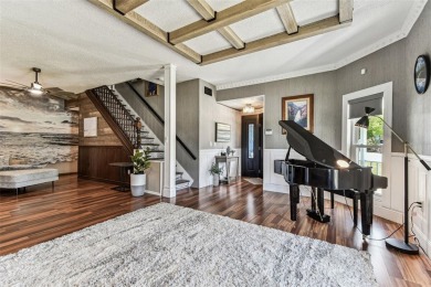 Nestled on a beautifully positioned corner lot directly across on Clearwater Country Club in Florida - for sale on GolfHomes.com, golf home, golf lot