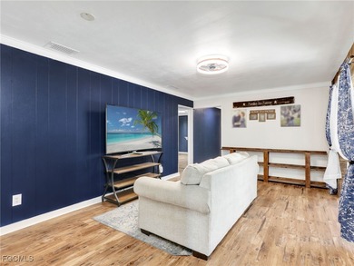 Beautiful 4-bedroom, 2-bath pool home in the highly desirable on Cypress Lake Country Club in Florida - for sale on GolfHomes.com, golf home, golf lot