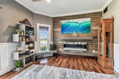Nestled on a beautifully positioned corner lot directly across on Clearwater Country Club in Florida - for sale on GolfHomes.com, golf home, golf lot