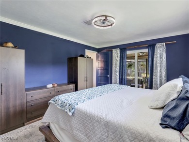 Beautiful 4-bedroom, 2-bath pool home in the highly desirable on Cypress Lake Country Club in Florida - for sale on GolfHomes.com, golf home, golf lot