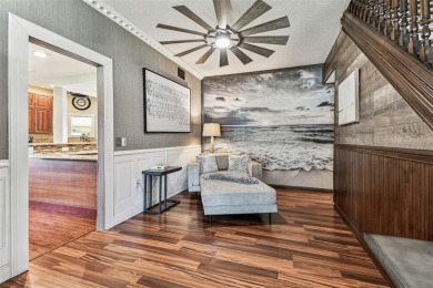 Nestled on a beautifully positioned corner lot directly across on Clearwater Country Club in Florida - for sale on GolfHomes.com, golf home, golf lot