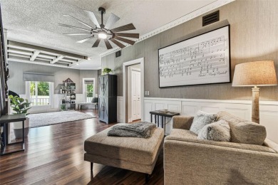 Nestled on a beautifully positioned corner lot directly across on Clearwater Country Club in Florida - for sale on GolfHomes.com, golf home, golf lot