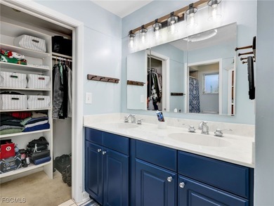 Beautiful 4-bedroom, 2-bath pool home in the highly desirable on Cypress Lake Country Club in Florida - for sale on GolfHomes.com, golf home, golf lot