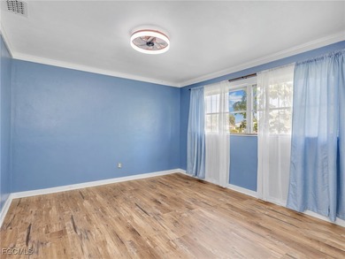 Beautiful 4-bedroom, 2-bath pool home in the highly desirable on Cypress Lake Country Club in Florida - for sale on GolfHomes.com, golf home, golf lot