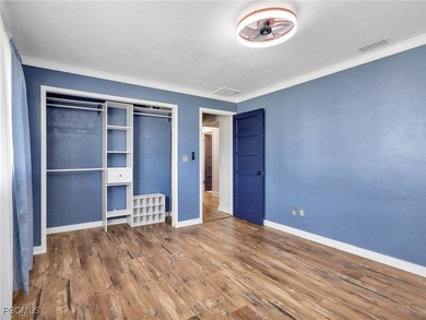 Beautiful 4-bedroom, 2-bath pool home in the highly desirable on Cypress Lake Country Club in Florida - for sale on GolfHomes.com, golf home, golf lot