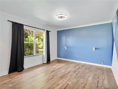 Beautiful 4-bedroom, 2-bath pool home in the highly desirable on Cypress Lake Country Club in Florida - for sale on GolfHomes.com, golf home, golf lot